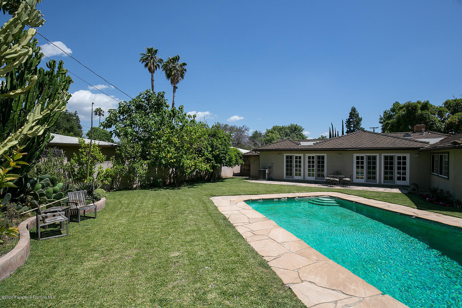 2855 Sheffield Road San Marino, CA 91108 - Photo 36 of 36 a view of a house with a swimming pool