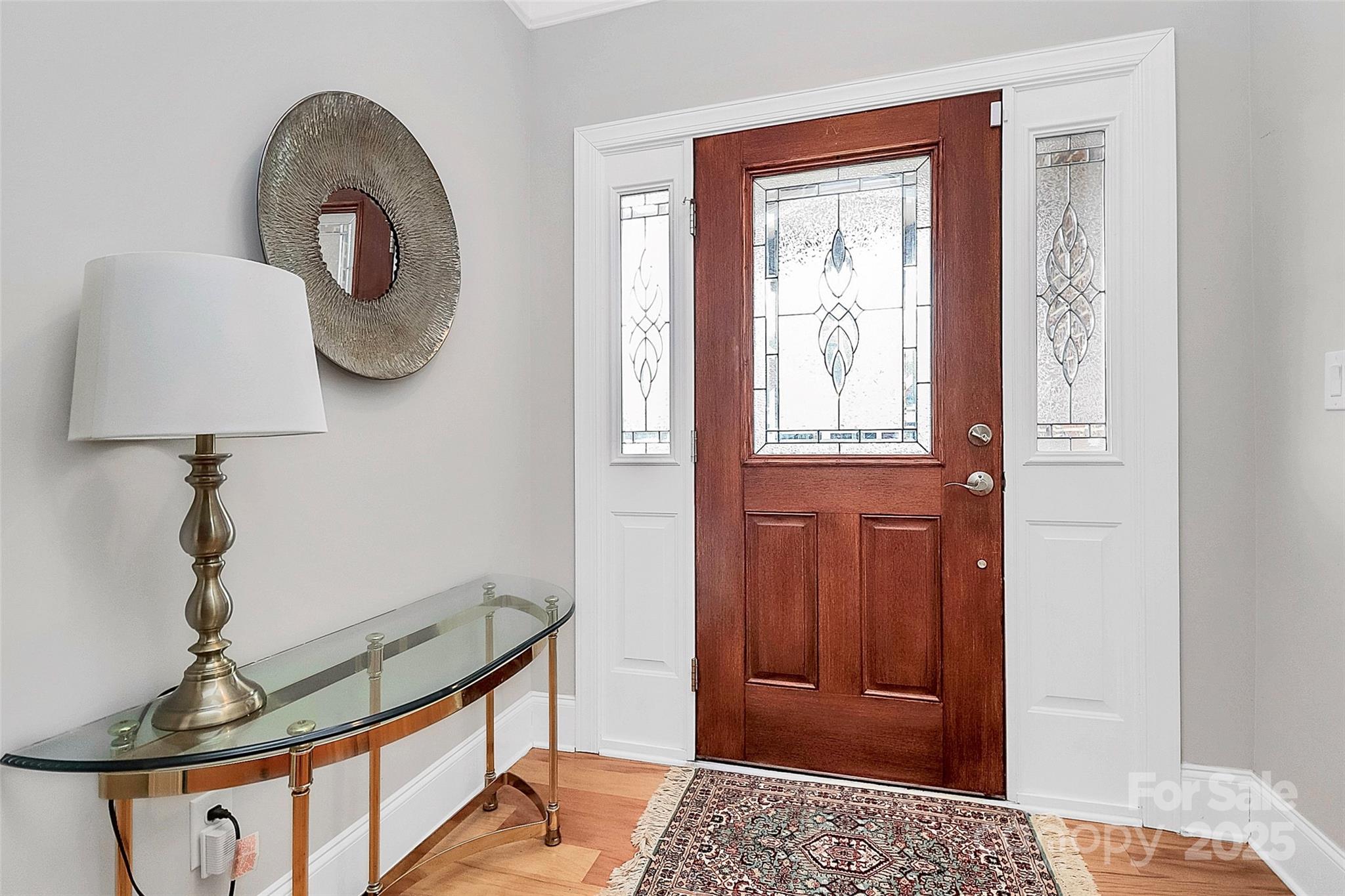 535 Chalmers Row Rock Hill, SC 29732 - Photo 17 of 38 a view of entryway with a potted plant and wooden floor