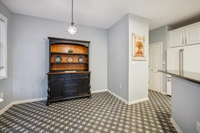 a bedroom with a bed and a cabinets