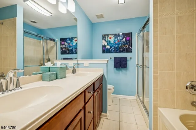 a bathroom with a sink a vanity and a mirror