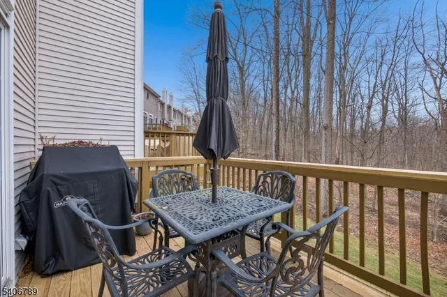 a view of balcony with furniture