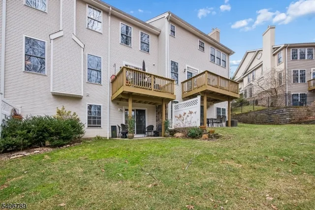 a view of a building with a yard