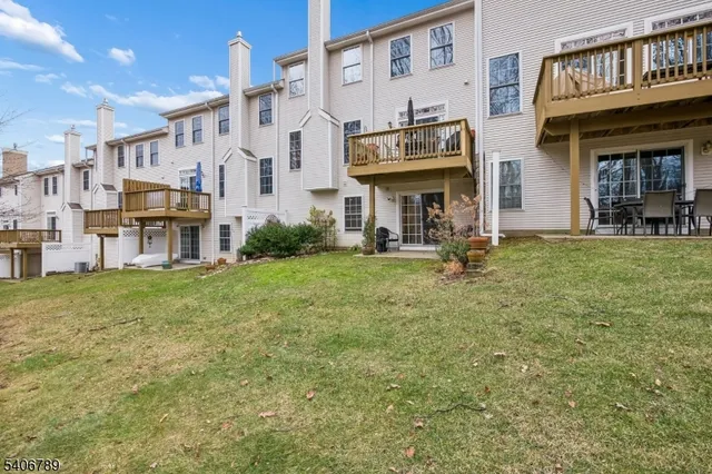 a view of a building with a yard