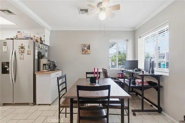 a kitchen with stainless steel appliances granite countertop a stove sink and refrigerator
