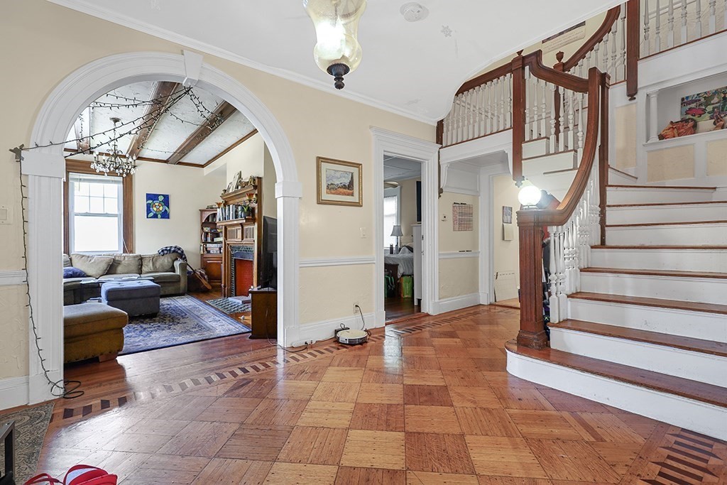 70 Peter Parley Road Boston, MA 02130 - Photo 11 of 35 a view of entryway livingroom and hall with wooden floor