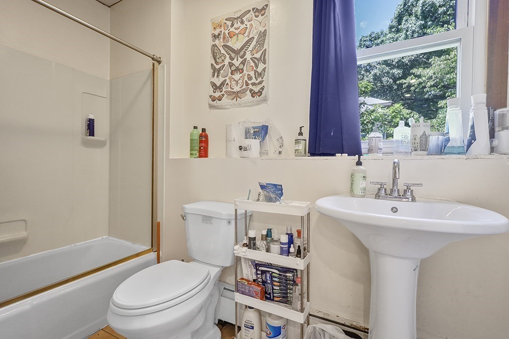 70 Peter Parley Road Boston, MA 02130 - Photo 19 of 35 a bathroom with a sink toilet and a bathtub