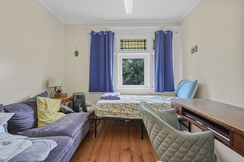 70 Peter Parley Road Boston, MA 02130 - Photo 21 of 35 a living room with furniture and a window
