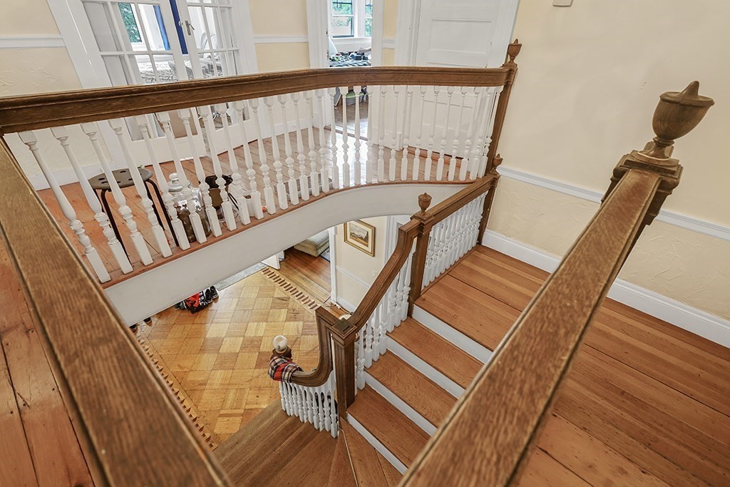 70 Peter Parley Road Boston, MA 02130 - Photo 22 of 35 a view of wooden staircase