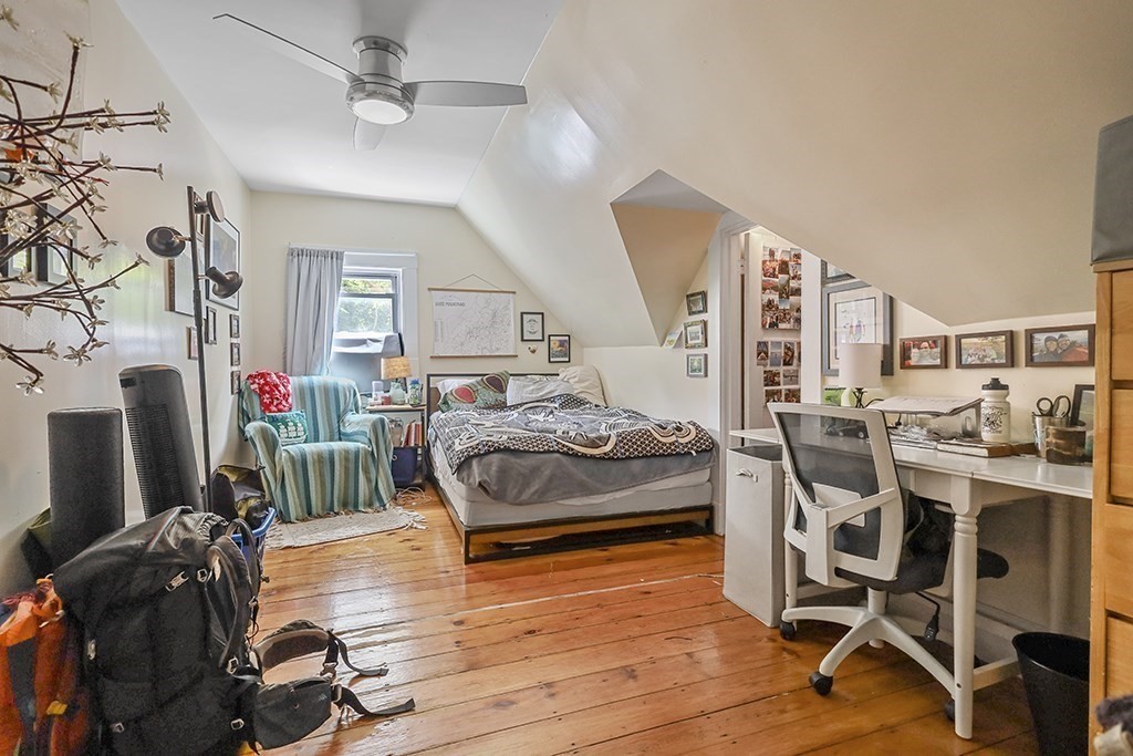 70 Peter Parley Road Boston, MA 02130 - Photo 26 of 35 a living room with furniture and a flat screen tv