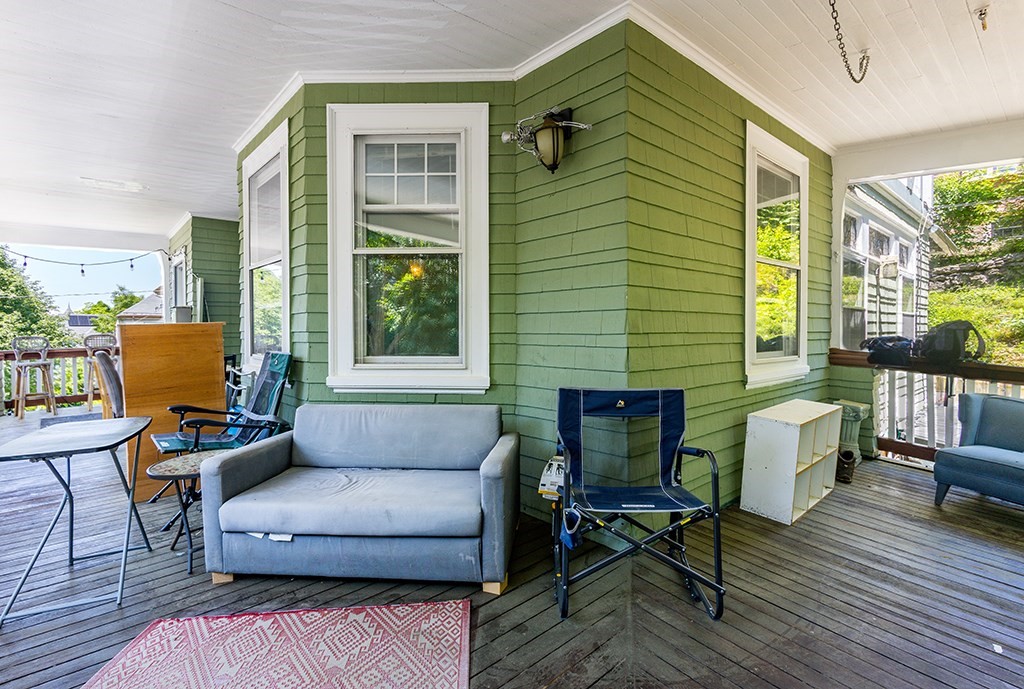 70 Peter Parley Road Boston, MA 02130 - Photo 7 of 35 a balcony with furniture and a potted plant