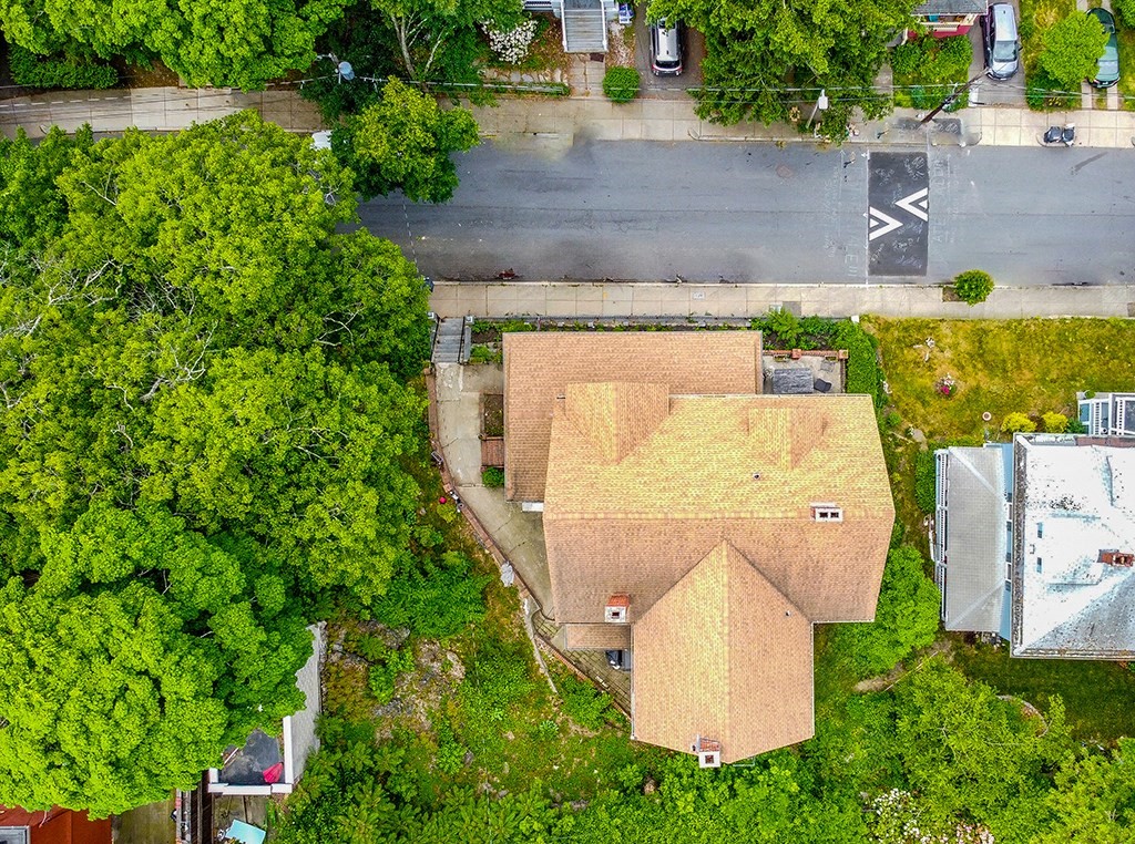 70 Peter Parley Road Boston, MA 02130 - Photo 9 of 35 an aerial view of a house with a yard and a fountain