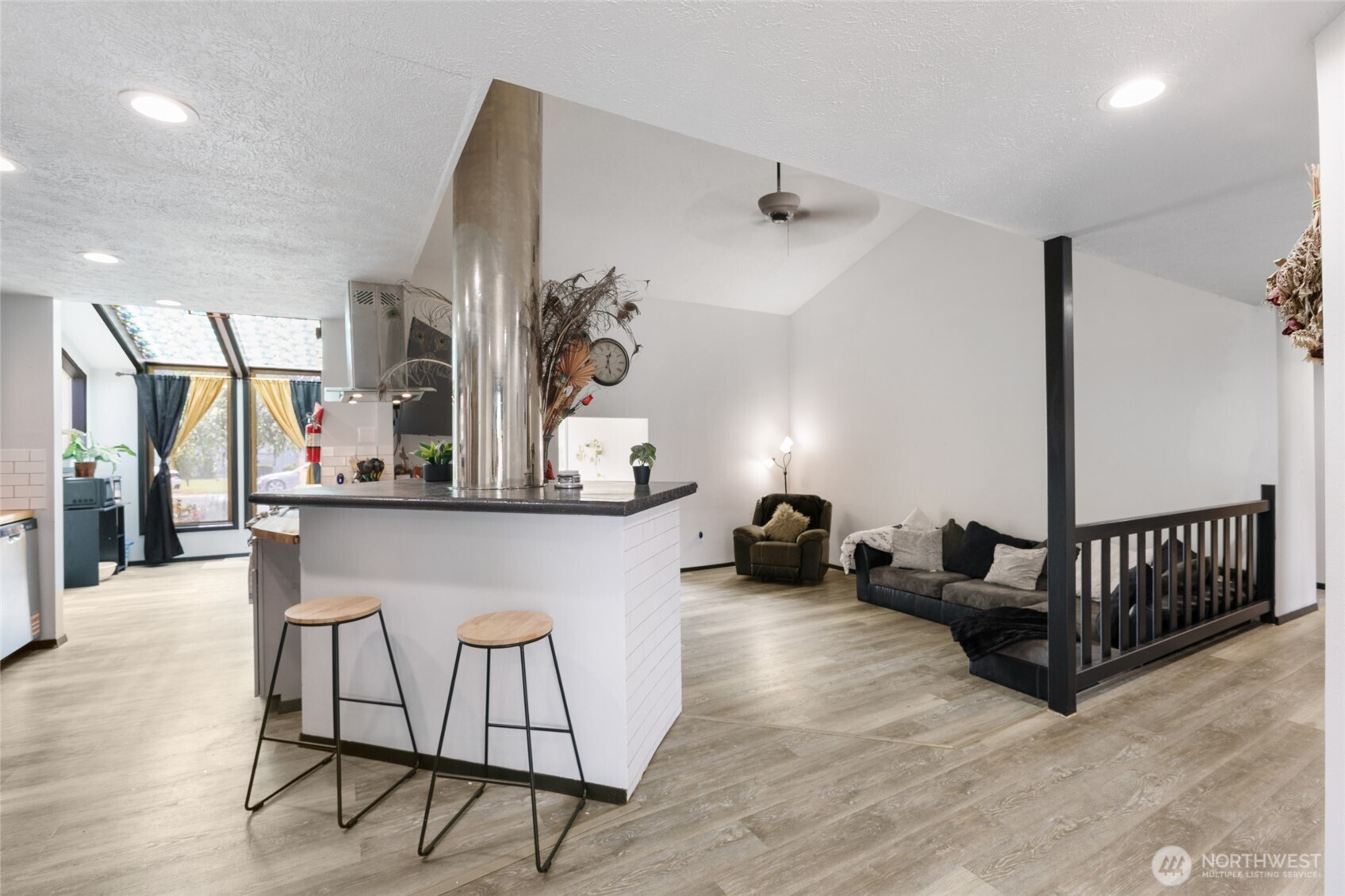 9307 Albert Way Southeast Moses Lake, WA 98837 - Photo 13 of 40 a living room with furniture and wooden floor