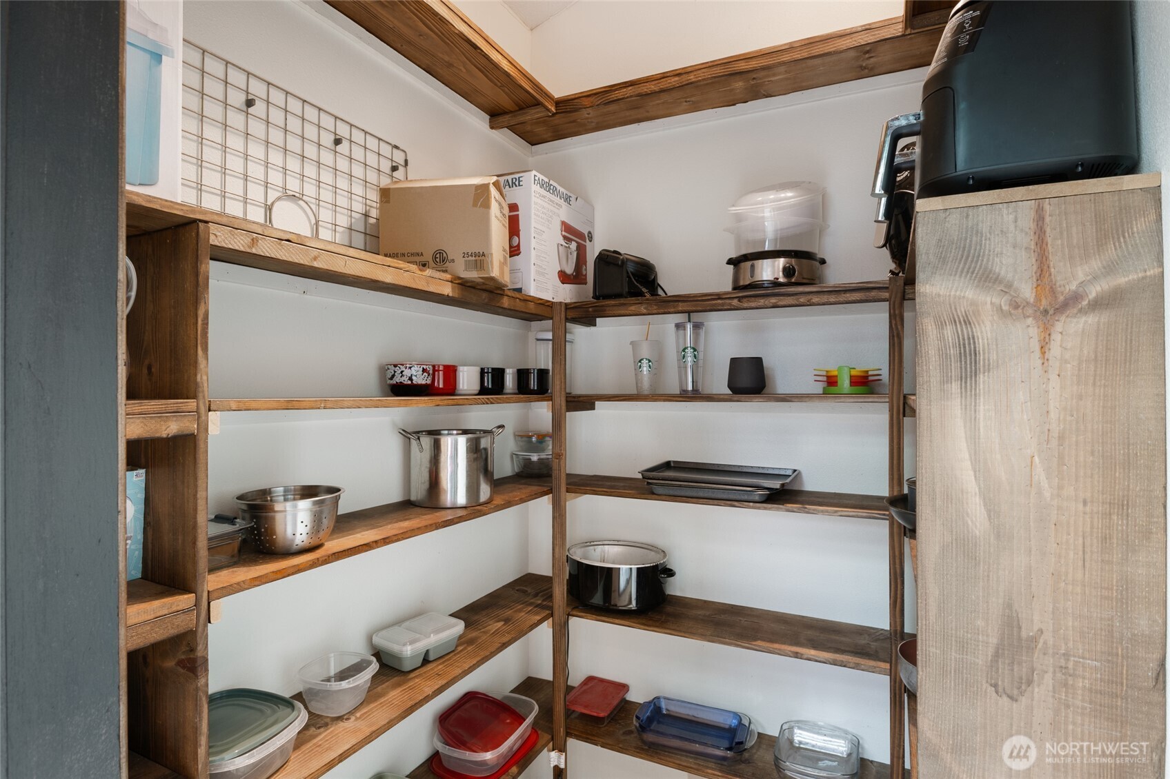 9307 Albert Way Southeast Moses Lake, WA 98837 - Photo 18 of 40 a kitchen with stainless steel appliances granite countertop a sink and cabinets