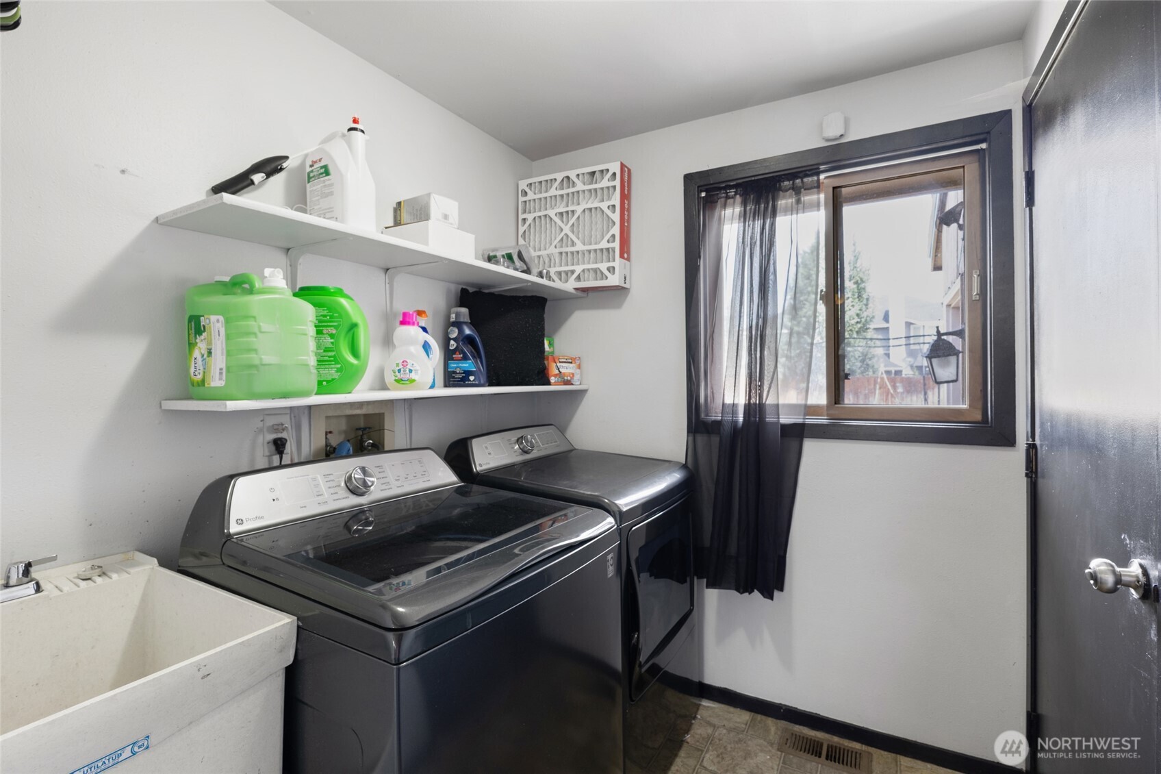 9307 Albert Way Southeast Moses Lake, WA 98837 - Photo 22 of 40 a room with storage and utility