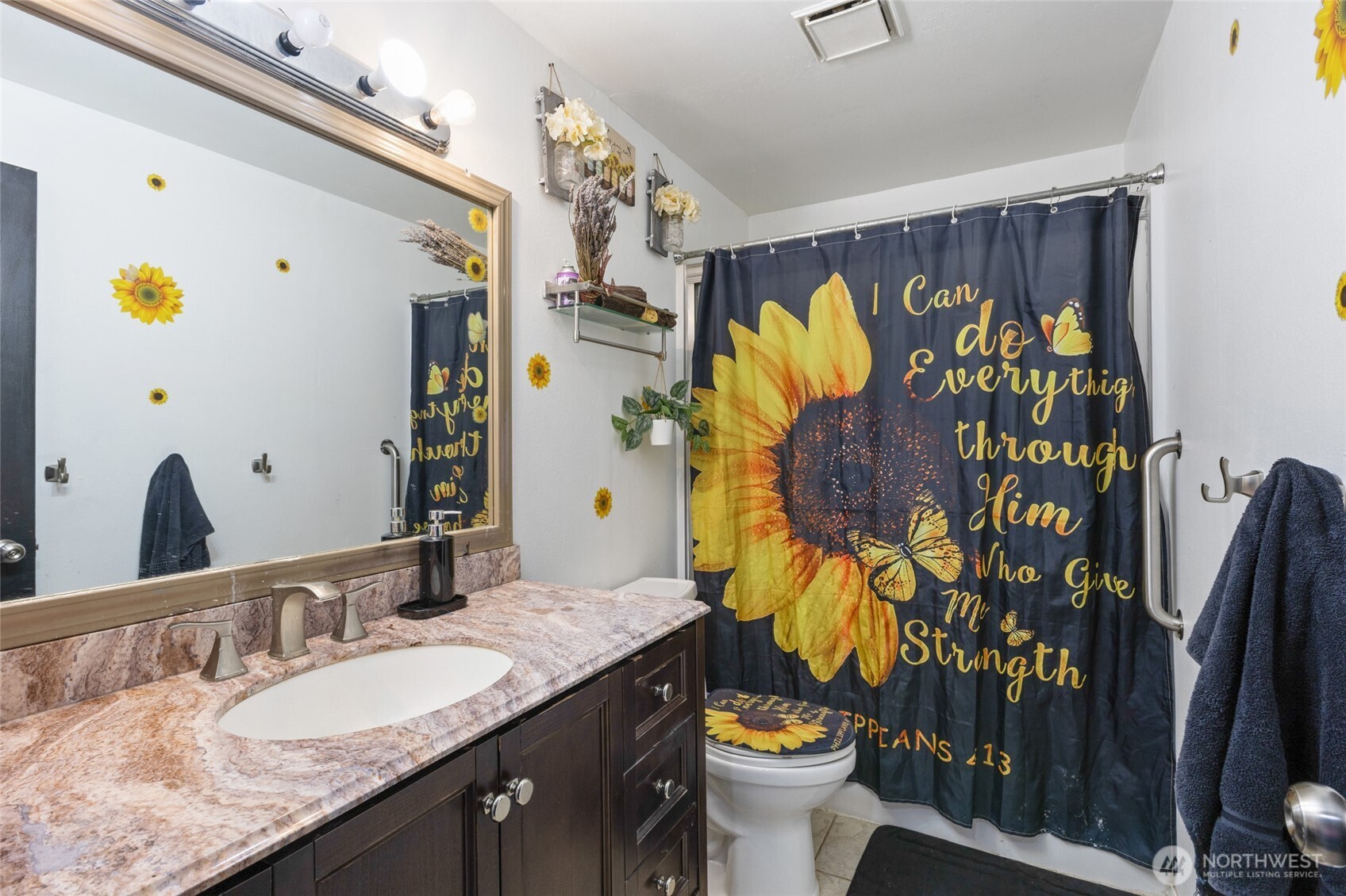 9307 Albert Way Southeast Moses Lake, WA 98837 - Photo 28 of 40 a bathroom with a granite countertop sink and a mirror