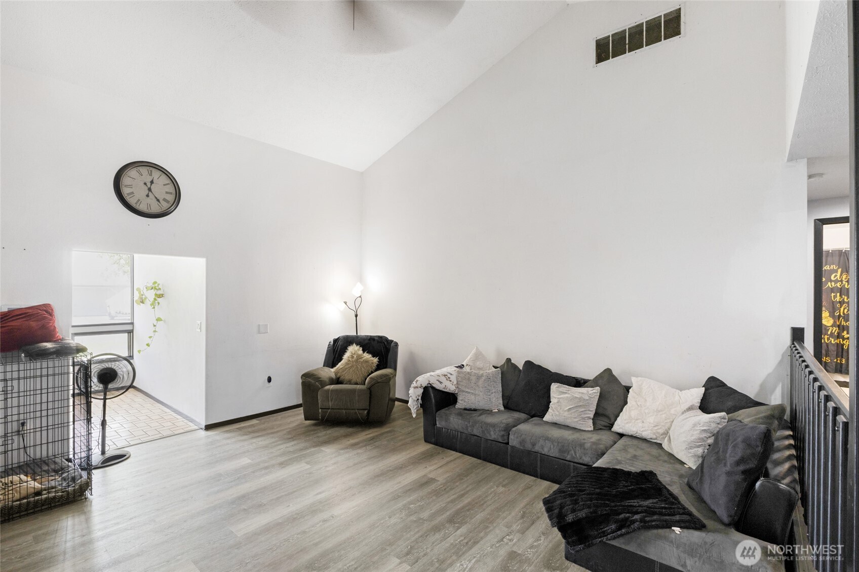 9307 Albert Way Southeast Moses Lake, WA 98837 - Photo 9 of 40 a living room with furniture a couch and a window