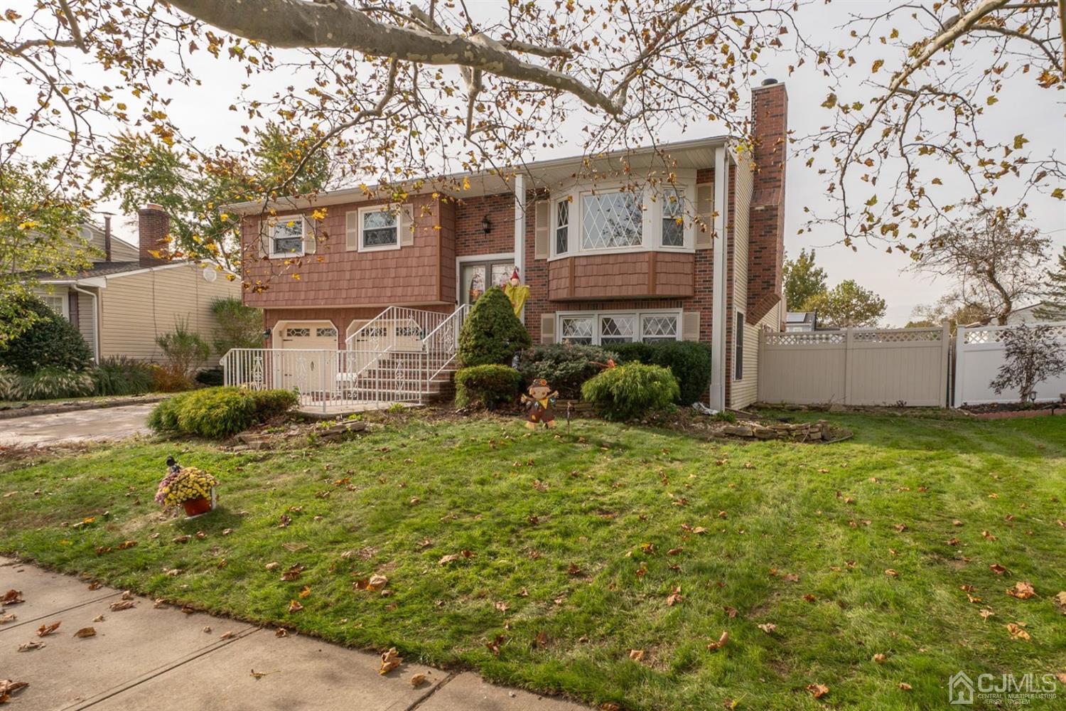 4 Hansen Road Old Bridge, NJ 08857 - Photo 2 of 39 front view of a house with a yard