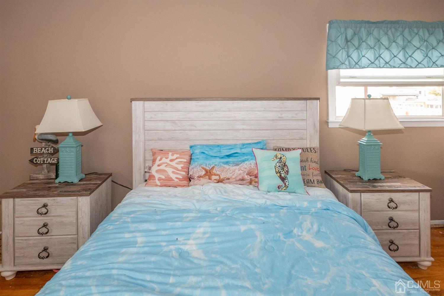 4 Hansen Road Old Bridge, NJ 08857 - Photo 17 of 39 a bedroom with a bed and a window