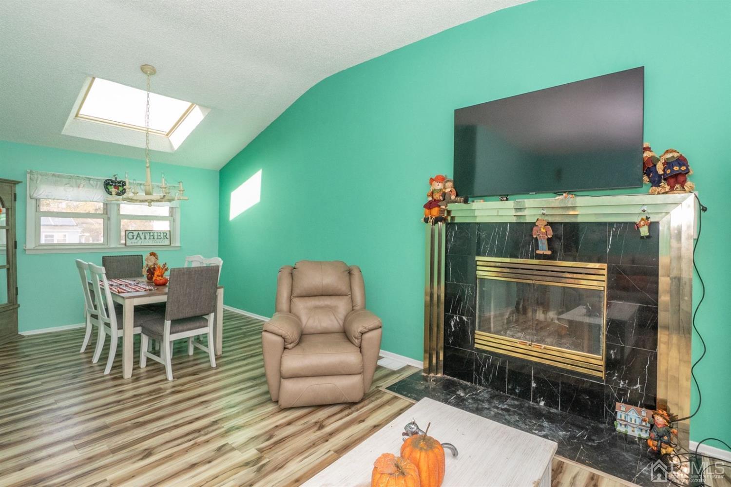 4 Hansen Road Old Bridge, NJ 08857 - Photo 7 of 39 a living room with furniture and a flat screen tv