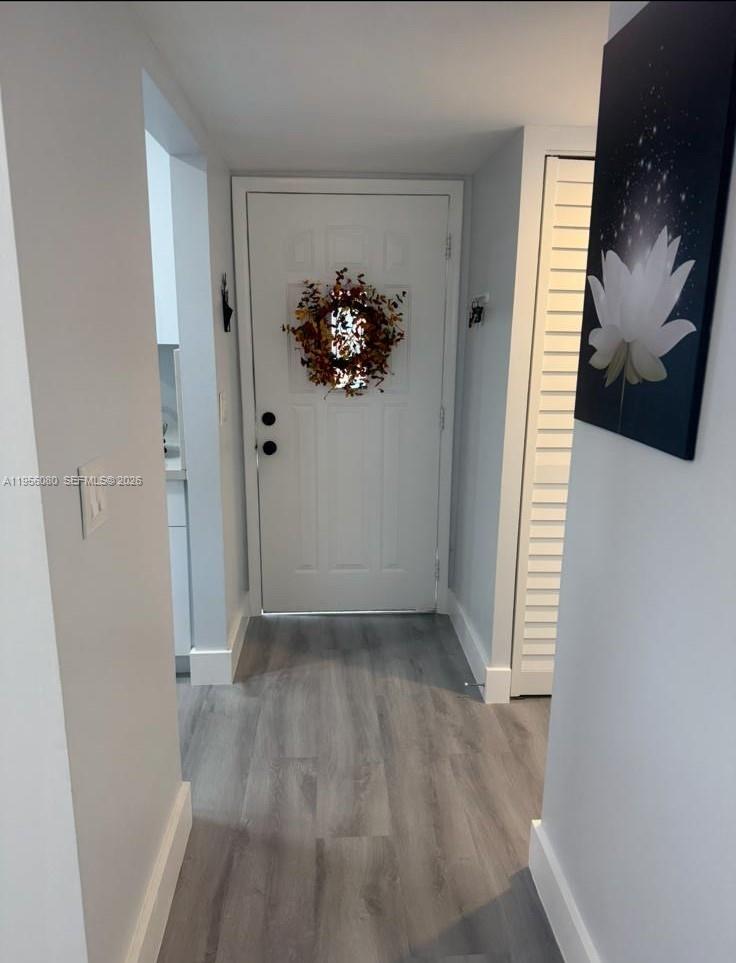 1327 Towhee Street Homestead, FL 33035 - Photo 18 of 31 a view of entryway with wooden floor