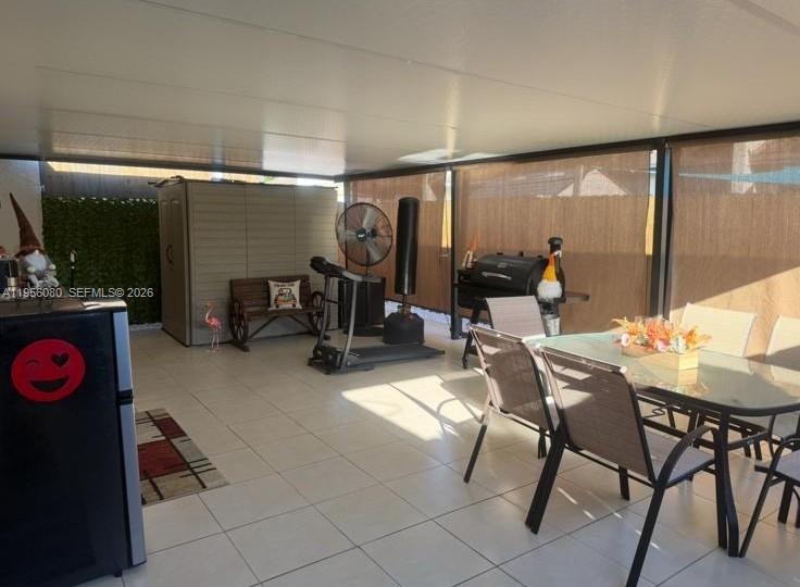 1327 Towhee Street Homestead, FL 33035 - Photo 7 of 31 a view of a room with gym equipment