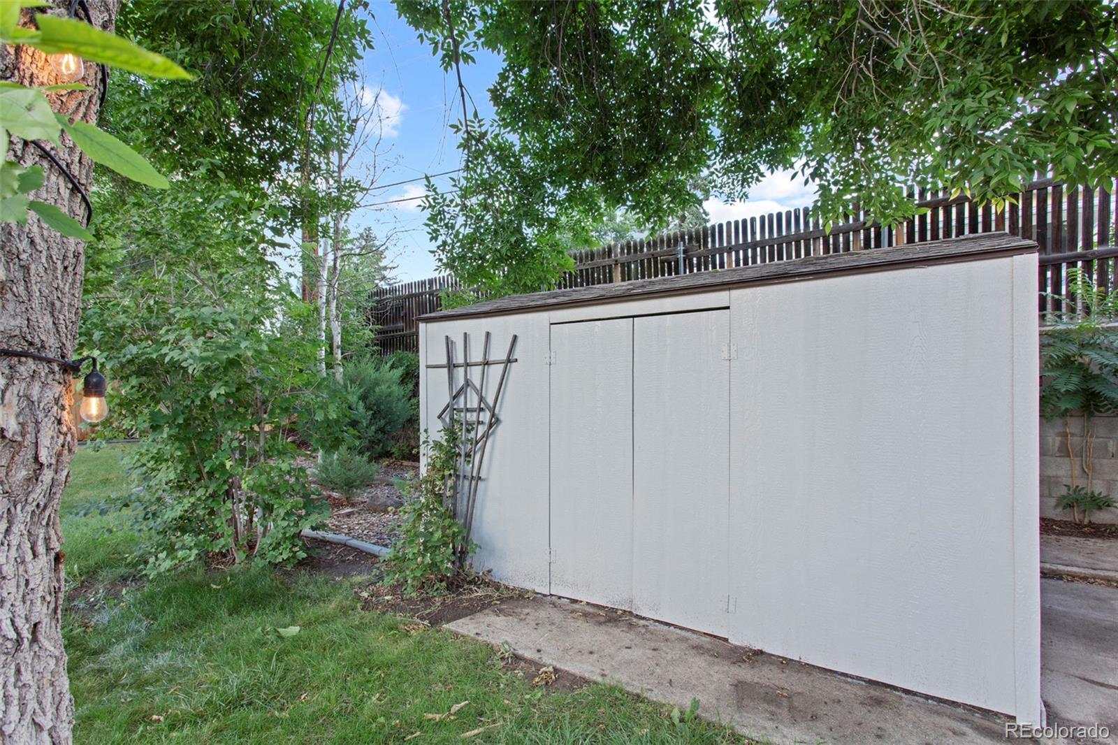 8060 Stuart Place Westminster, CO 80031 - Photo 17 of 18 a view of a small yard from a balcony