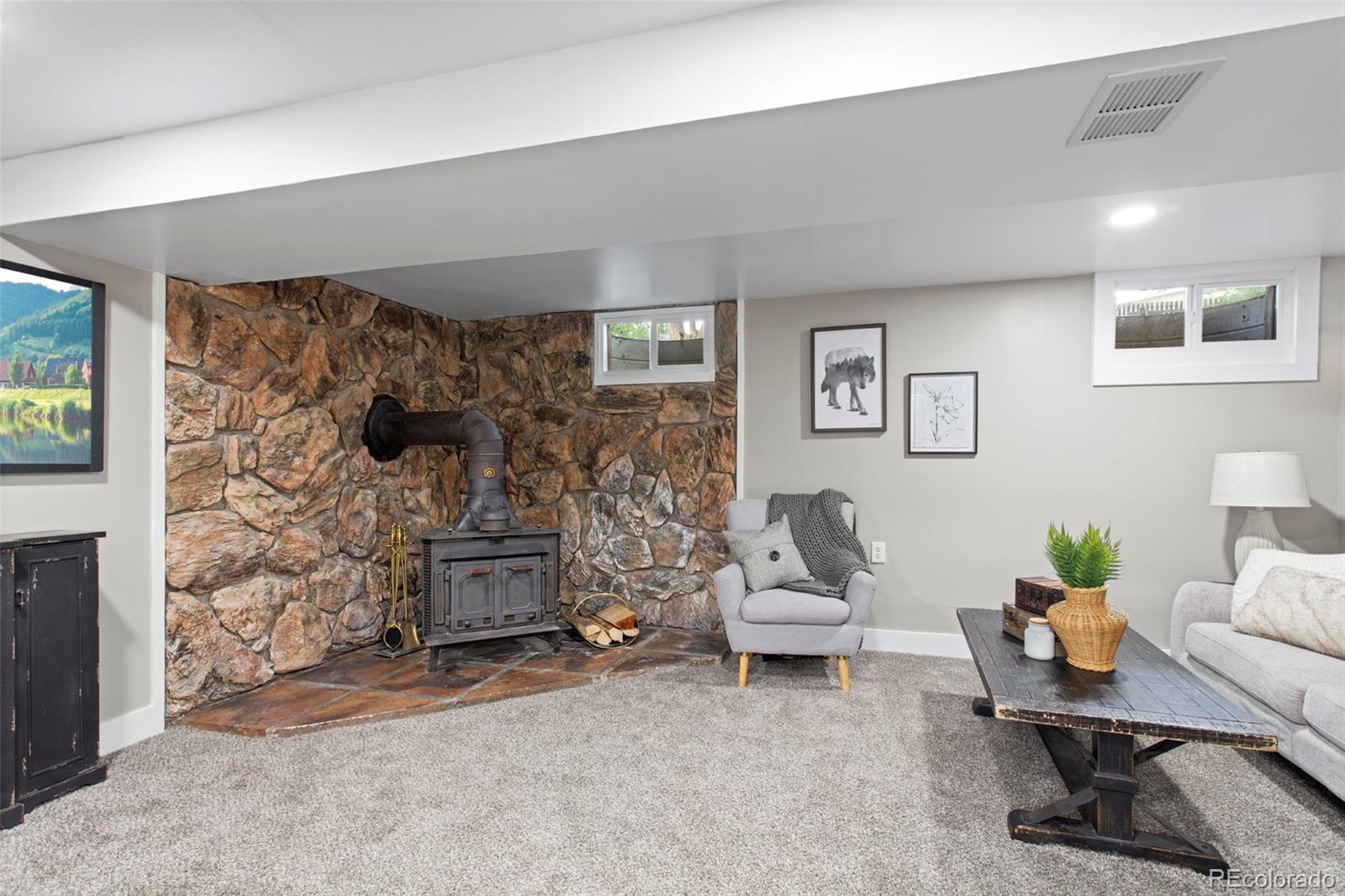 8060 Stuart Place Westminster, CO 80031 - Photo 10 of 18 a living room with furniture and a couch