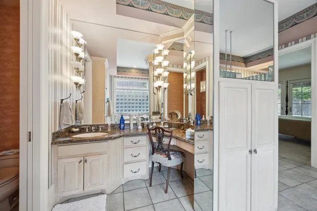 a view of a kitchen with appliances and cabinets