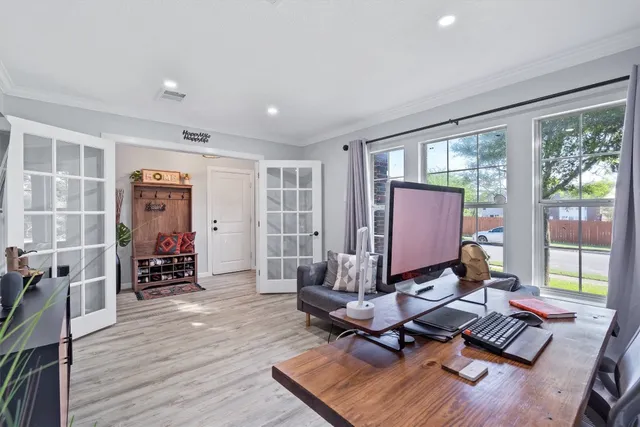 a room with furniture and wooden floor