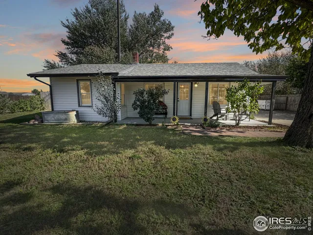a view of a porch with a yard
