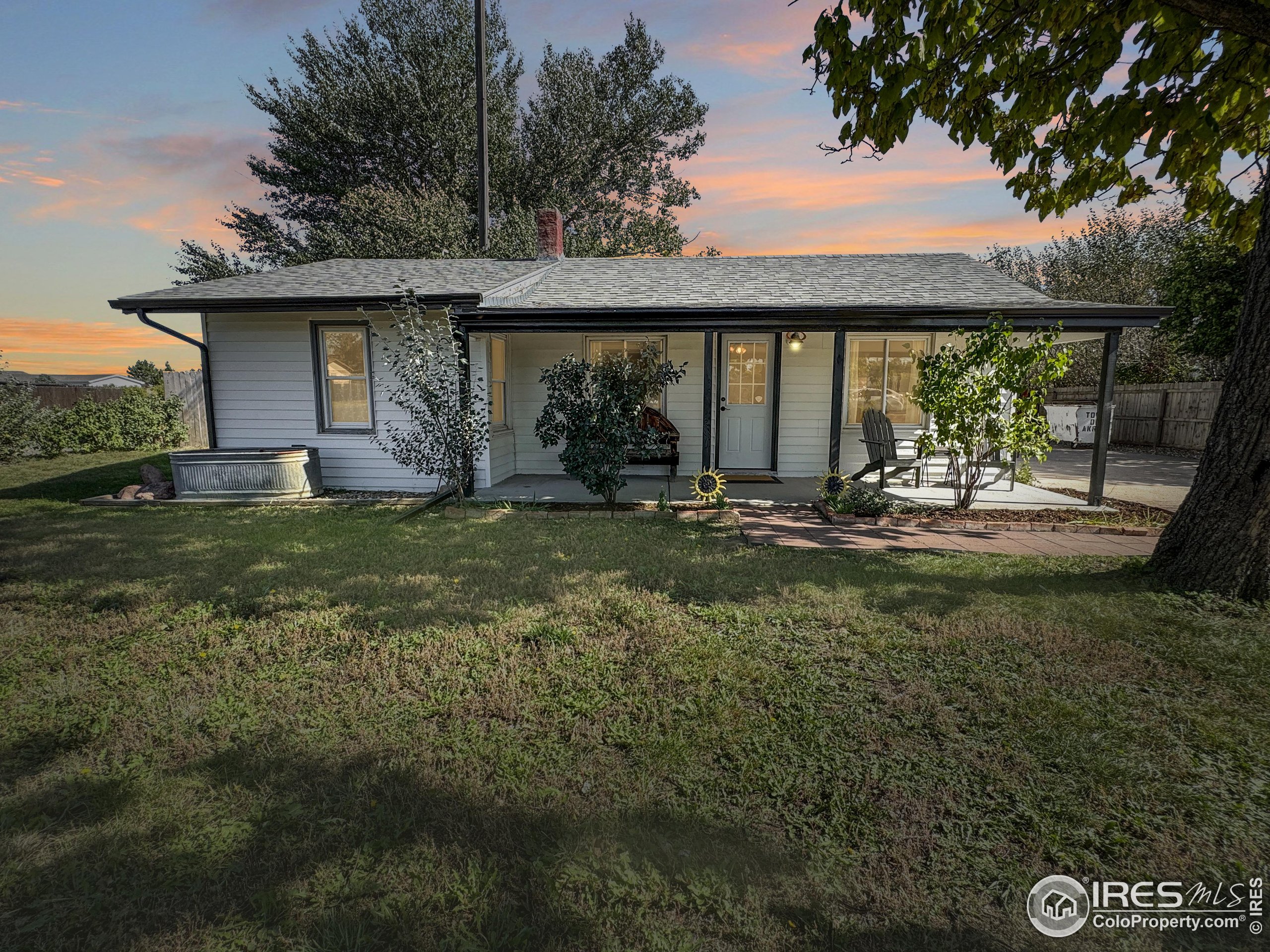 a view of a porch with a yard
