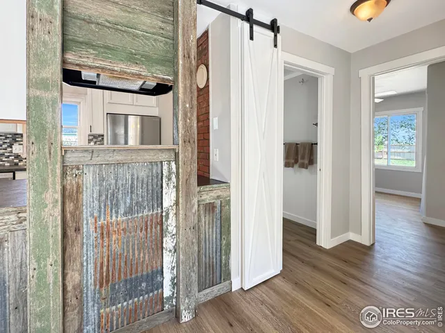 a view of front door and deck