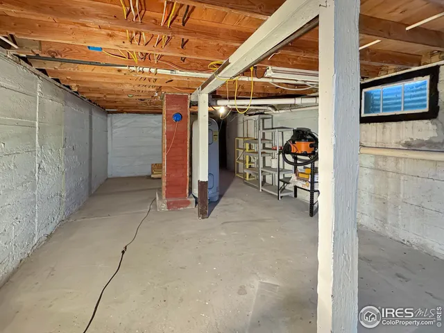 a view of a room with wooden walls