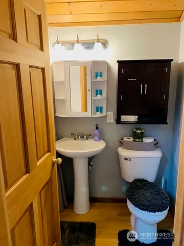 a bathroom with a sink and mirror