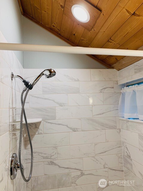5024 Saratoga Road, Unit STUDIO Langley, WA 98260 - Photo 15 of 17 a bathroom with a shower