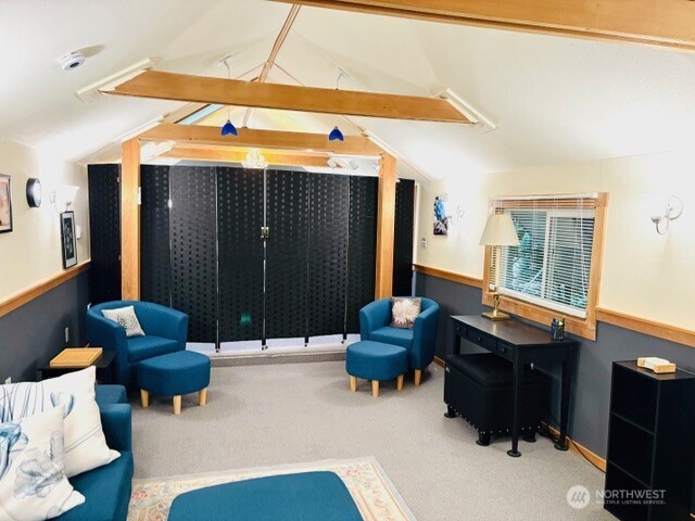 5024 Saratoga Road, Unit STUDIO Langley, WA 98260 - Photo 6 of 17 a living room with furniture and a window