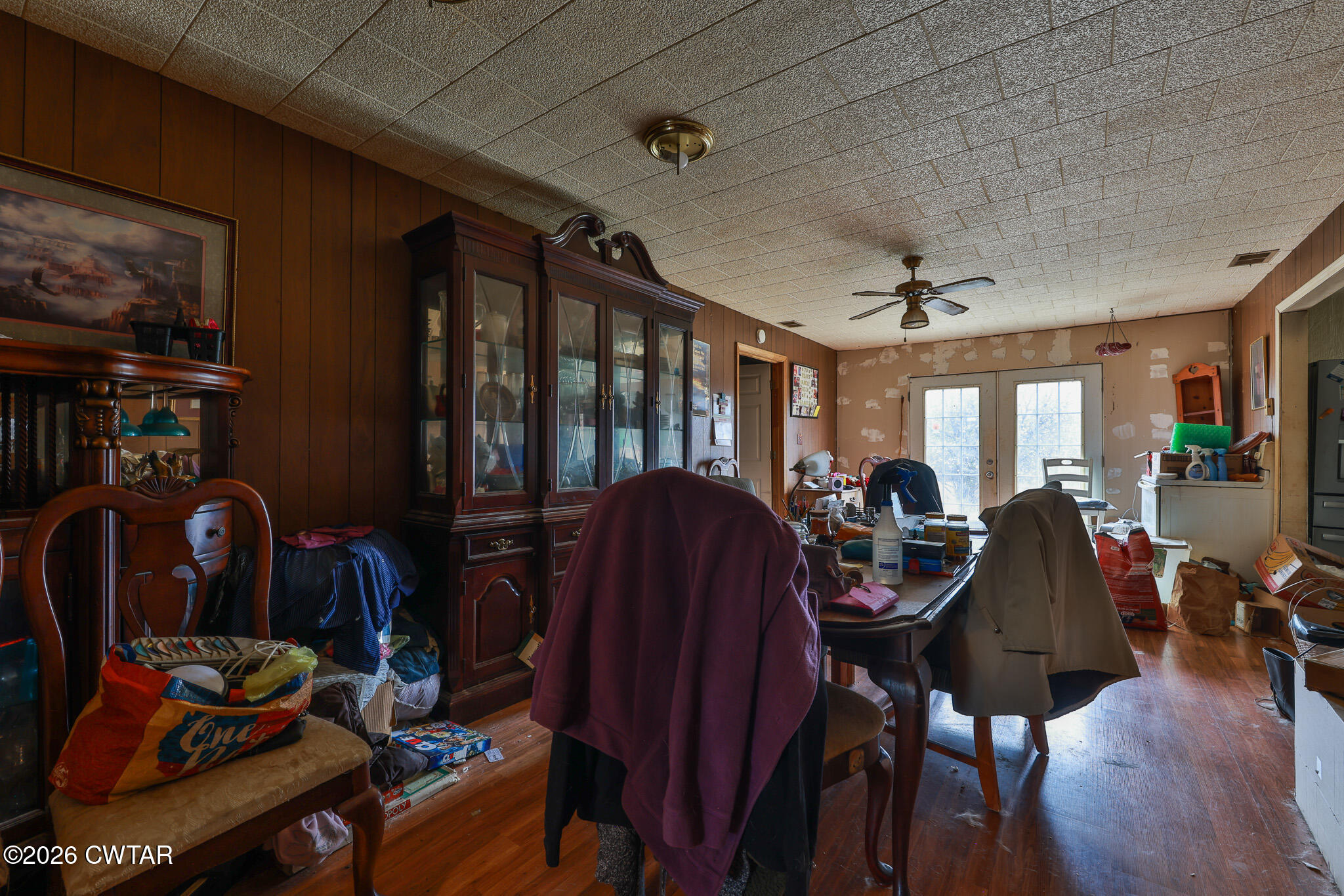 840 School Road Palmersville, TN 38241 - Photo 7 of 27 a view of a livingroom with furniture workspace and wooden floor