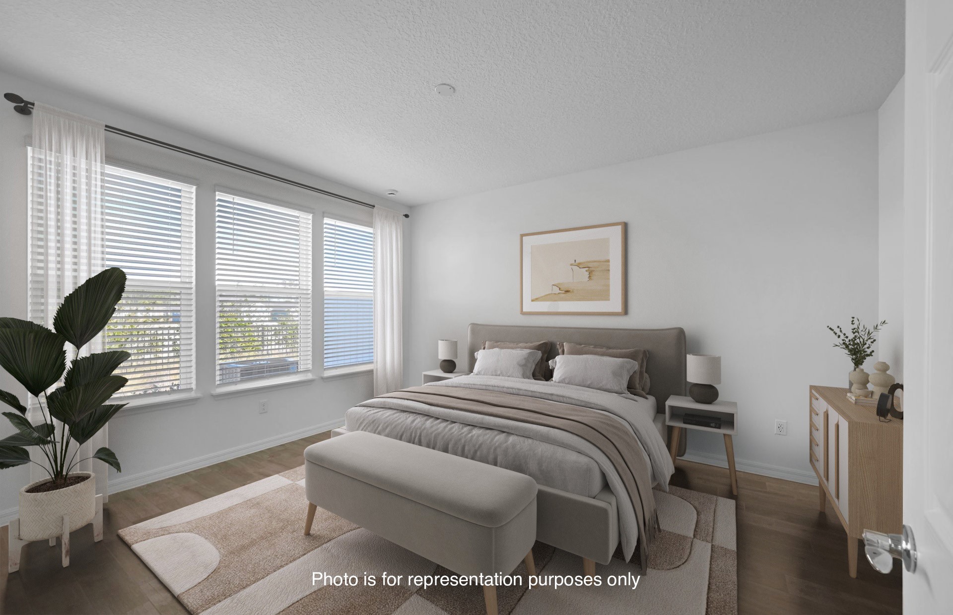 285 Ecliptic Loop Yulee, FL 32097 - Photo 18 of 42 a bedroom with furniture and a large window