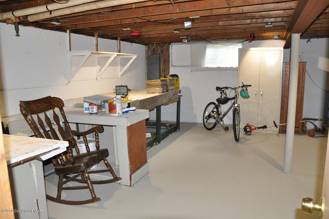 1041 Clover Road South Long Pond, PA 18334 - Photo 22 of 26 a view of a room with gym equipment