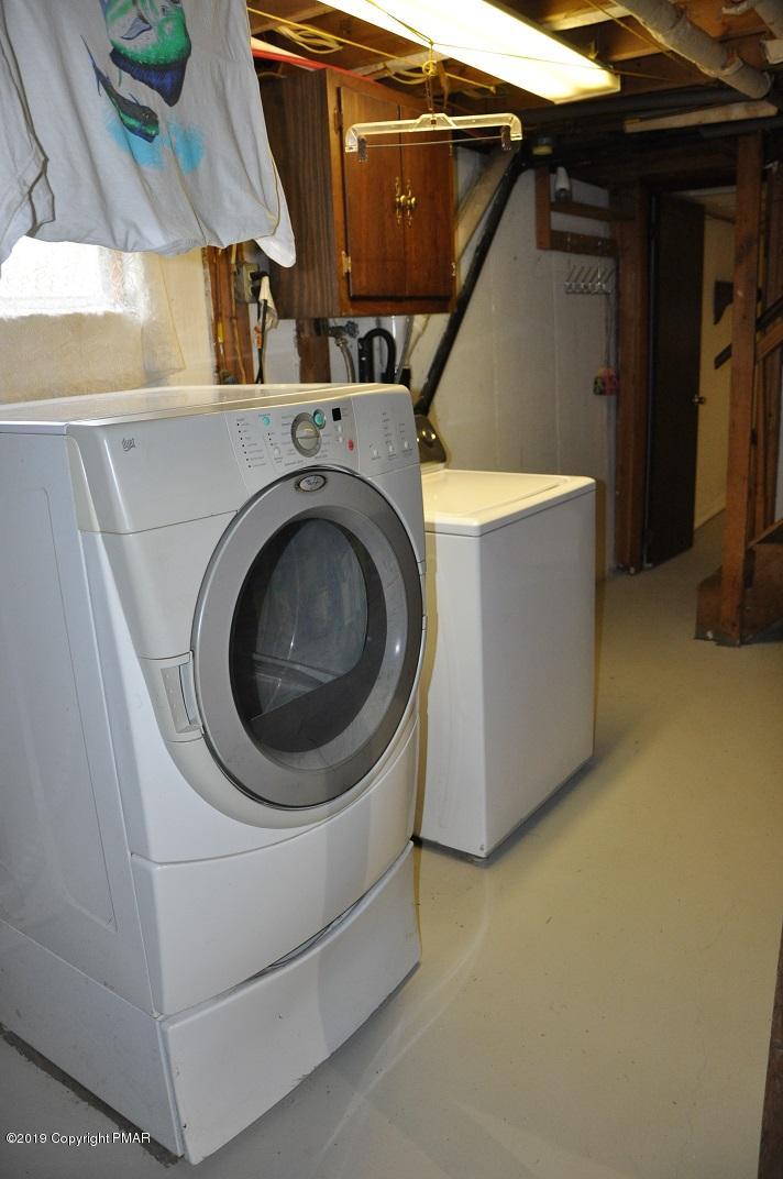 1041 Clover Road South Long Pond, PA 18334 - Photo 25 of 26 a utility room with dryer and washer