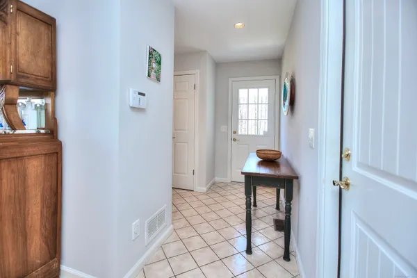 a view of entryway with wooden floor