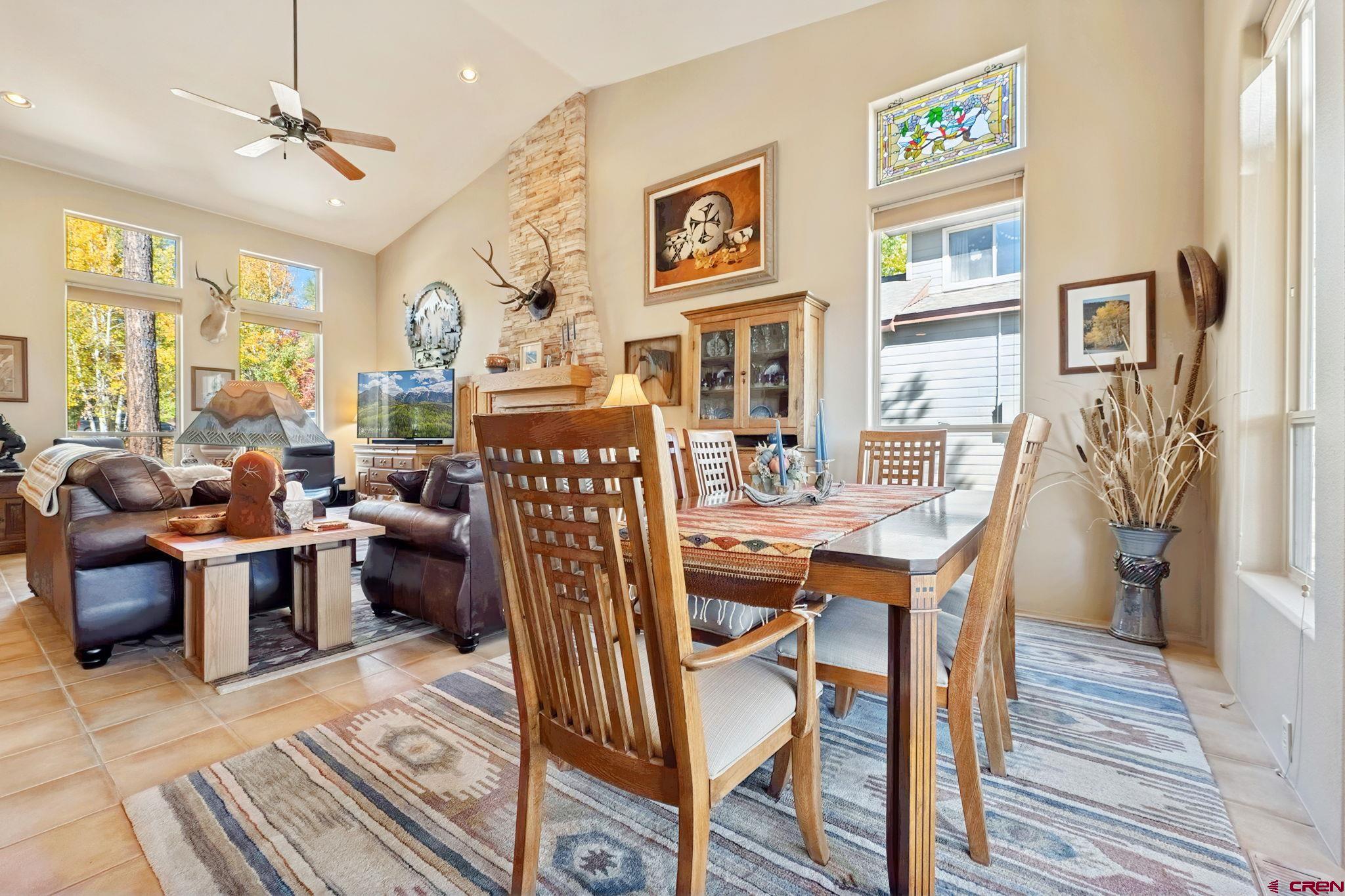 55 Edgemont Way Durango, CO 81301 - Photo 5 of 27 a dining room with furniture a rug and wooden floor
