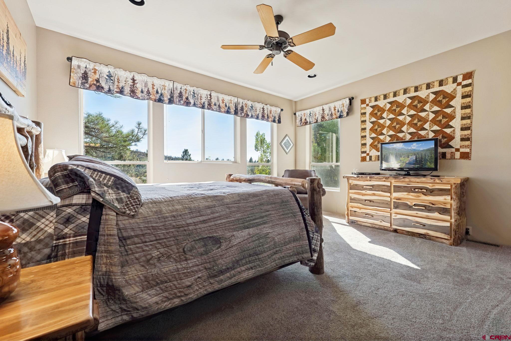 55 Edgemont Way Durango, CO 81301 - Photo 9 of 27 a bed sitting in a room next to a window