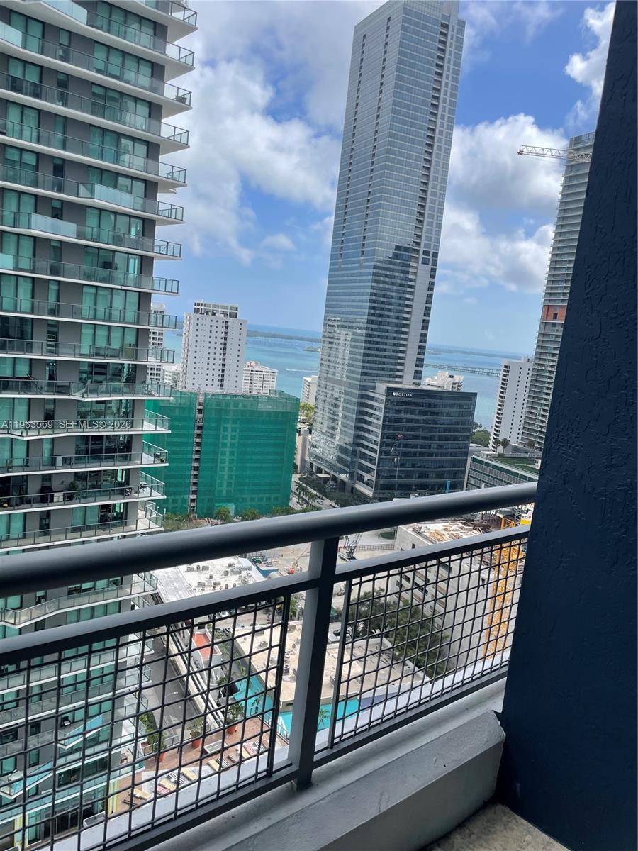 60 Southwest 13th Street, Unit 1806 Miami, FL 33130 - Photo 4 of 12 a city view from a balcony