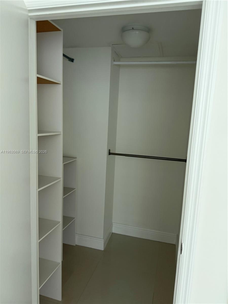 60 Southwest 13th Street, Unit 1806 Miami, FL 33130 - Photo 10 of 12 a view of a walk in closet