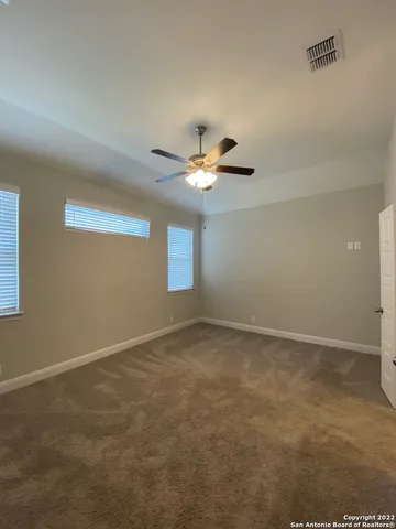 a view of room with wooden floor and window