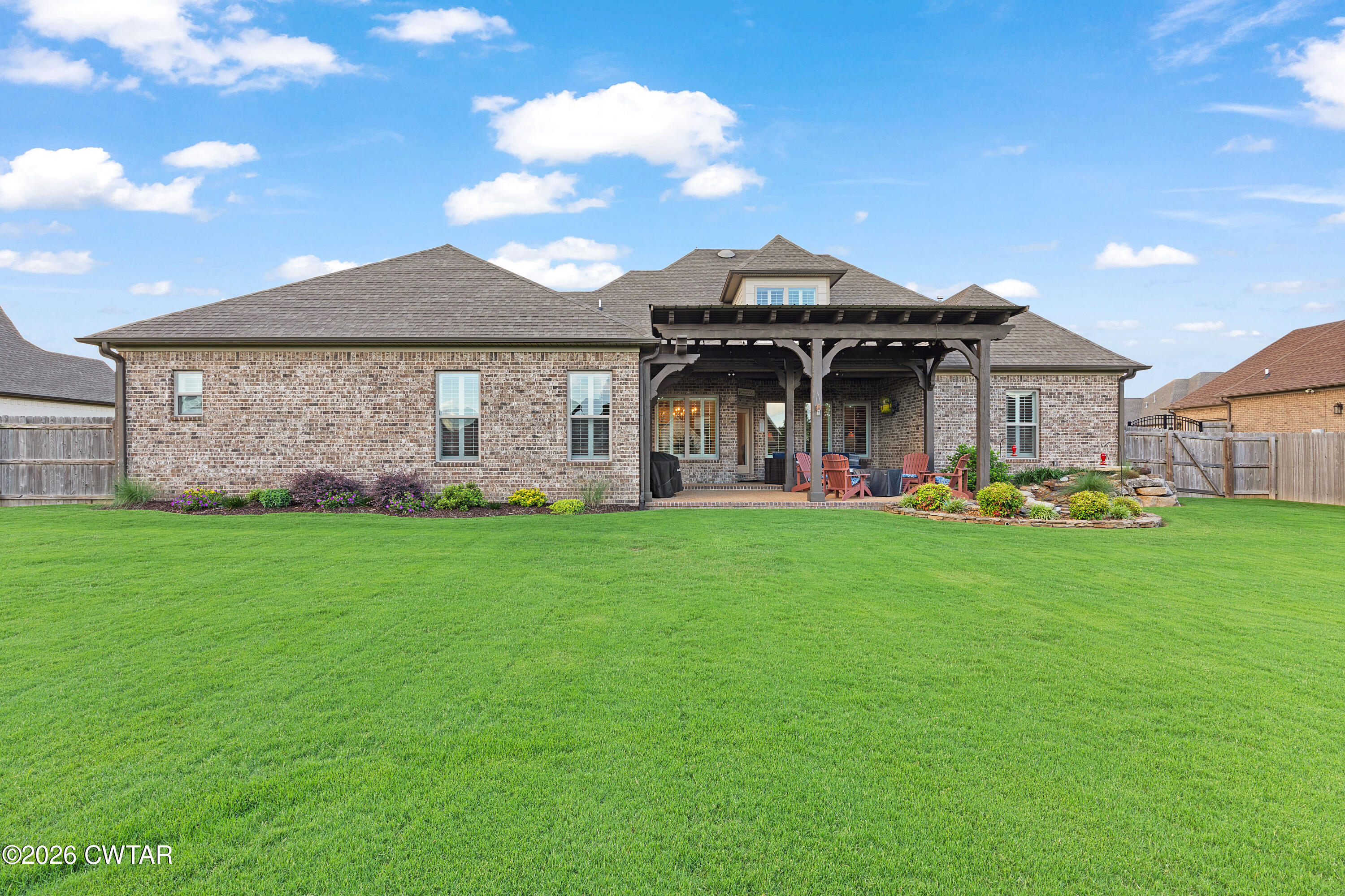 34 Cheddleton Cove Jackson, TN 38305 - Photo 29 of 32 a view of a big house with a big yard