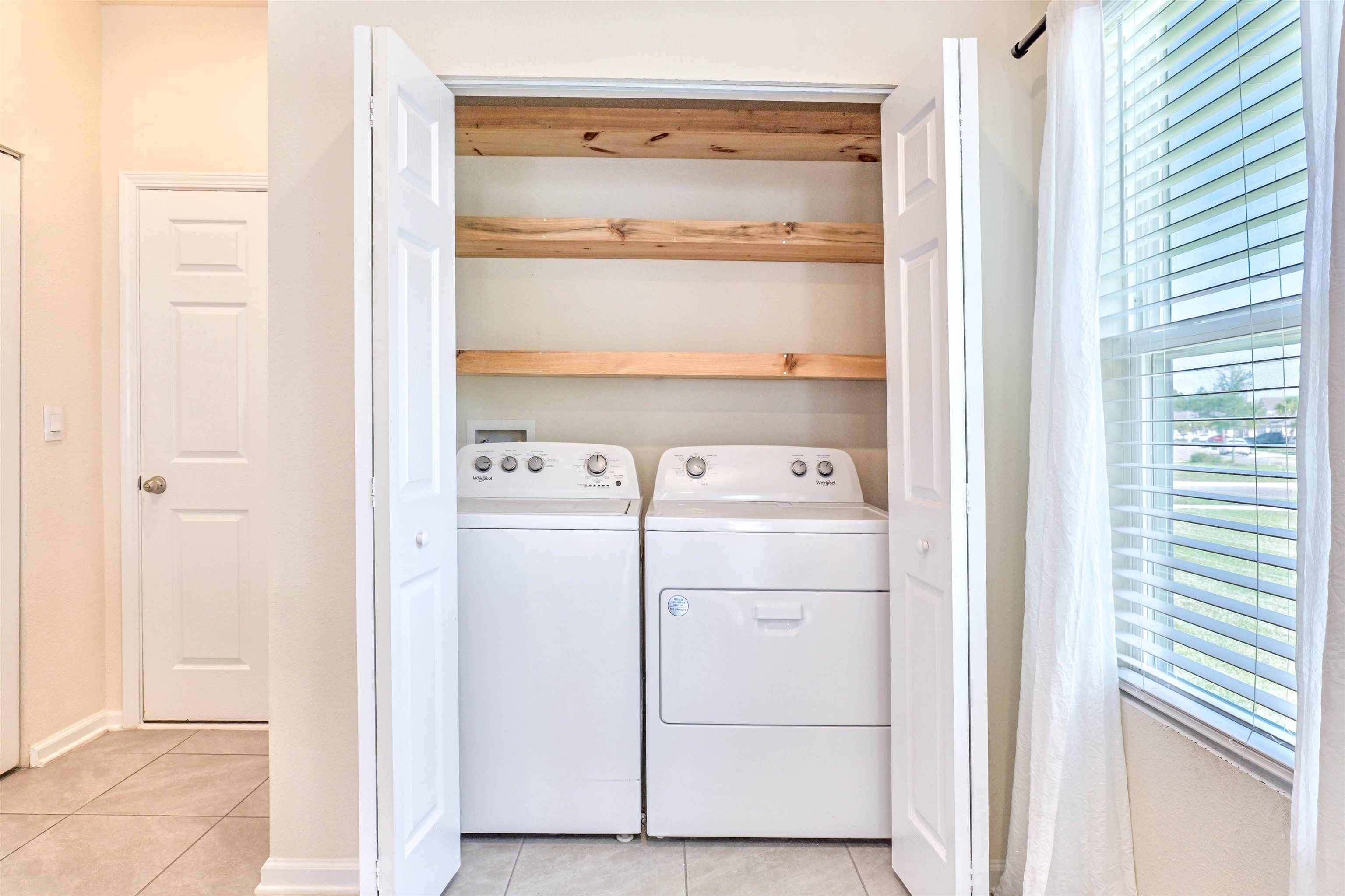 297 Coastline Way Street St. Augustine, FL 32092 - Photo 10 of 36 a utility room with dryer and washer