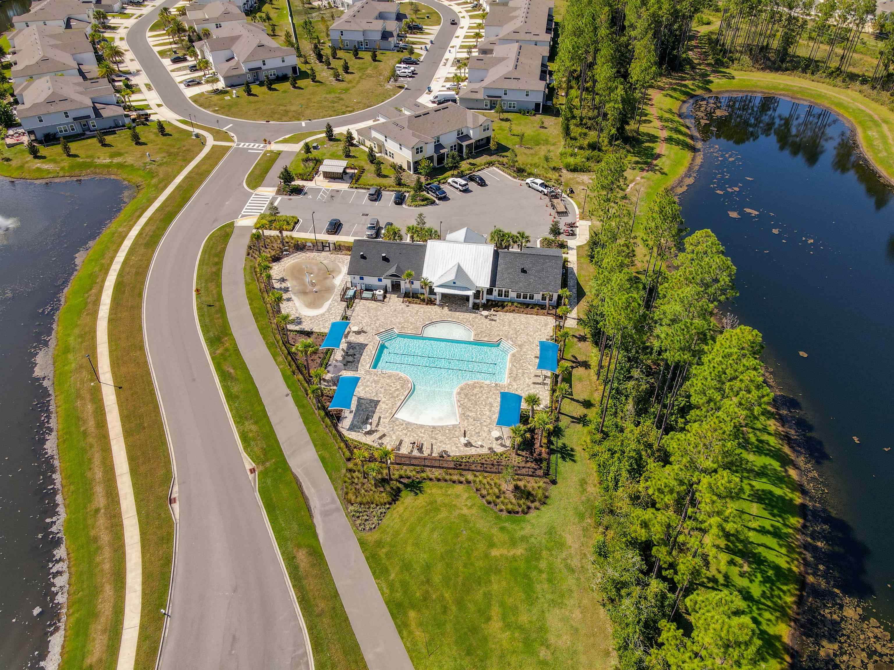 297 Coastline Way Street St. Augustine, FL 32092 - Photo 28 of 36 an aerial view of a swimming pool with outdoor seating