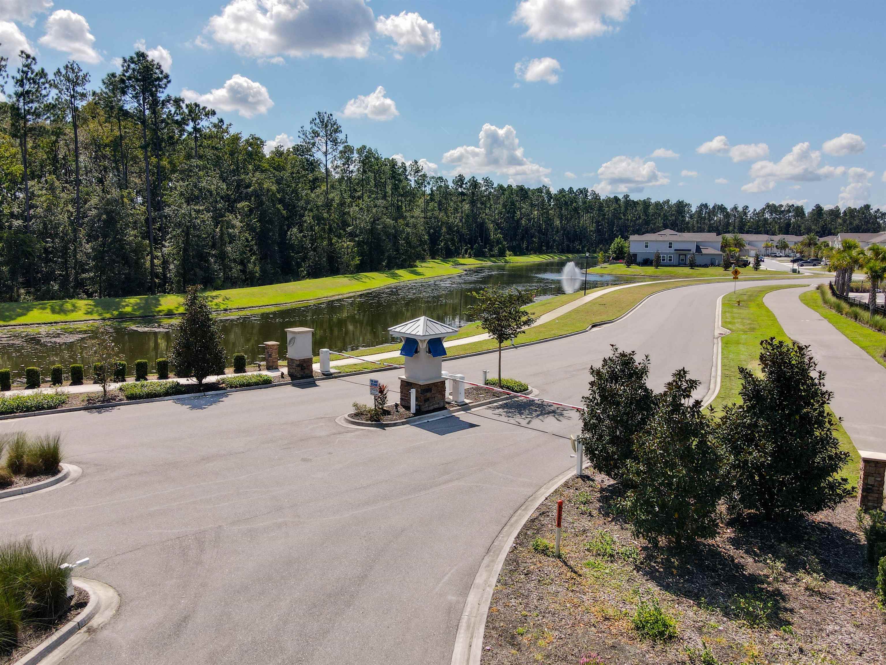 297 Coastline Way Street St. Augustine, FL 32092 - Photo 30 of 36 a view of a swimming pool and lounge chairs